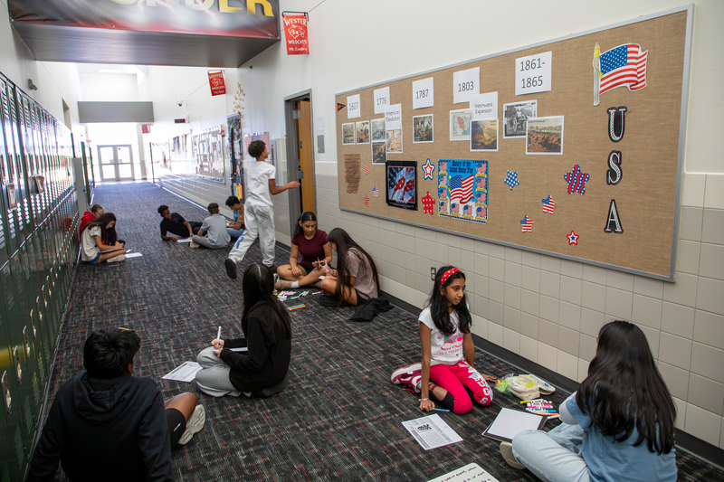 Wester students work on their posters.