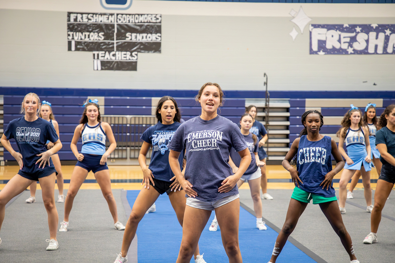 Cheer captains lead a routine.