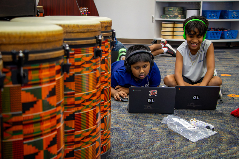 Students research operas.
