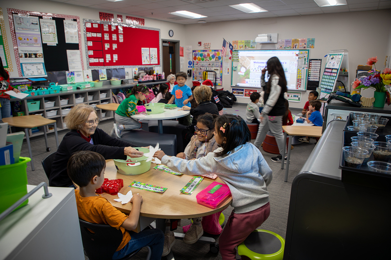 Seniors and Christie students work on ornaments.