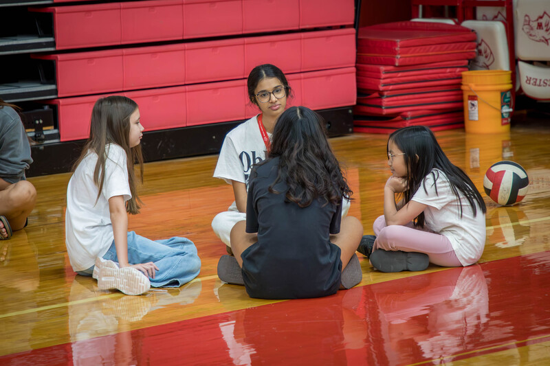 High schoolers chat with their PALees