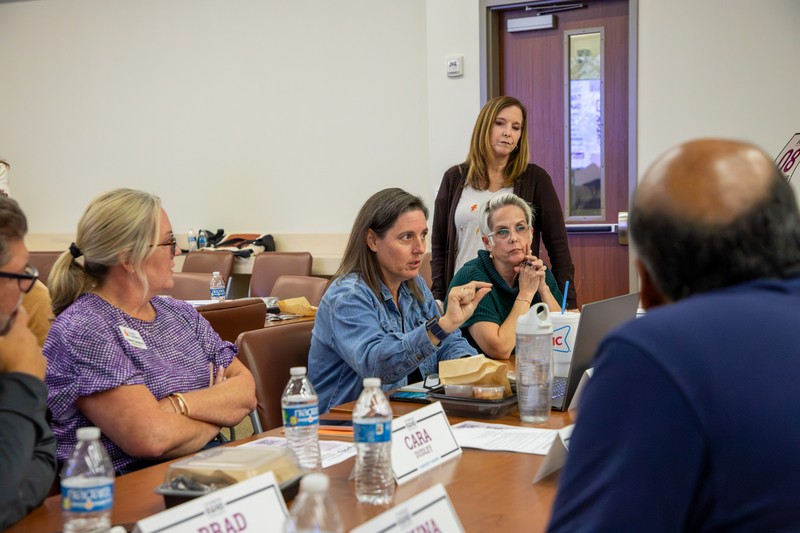 Committee members discuss the presentation and questions.