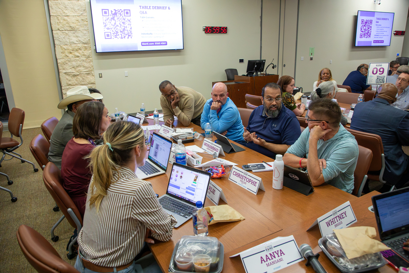 Committee members discuss the presentation and questions.