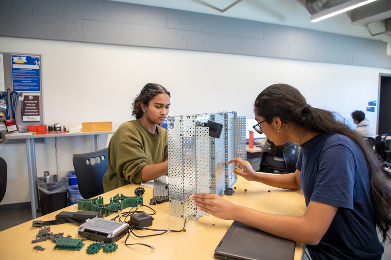 Engineering students collaborate on a project.