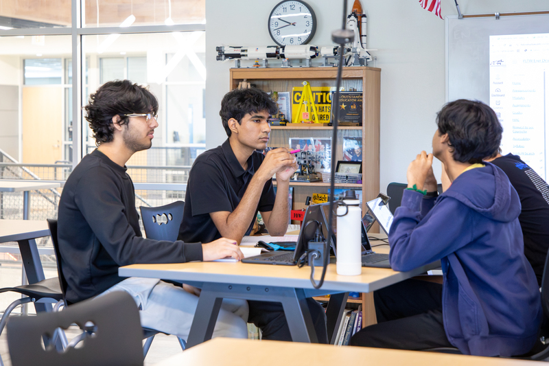 Engineering students collaborate on a project.