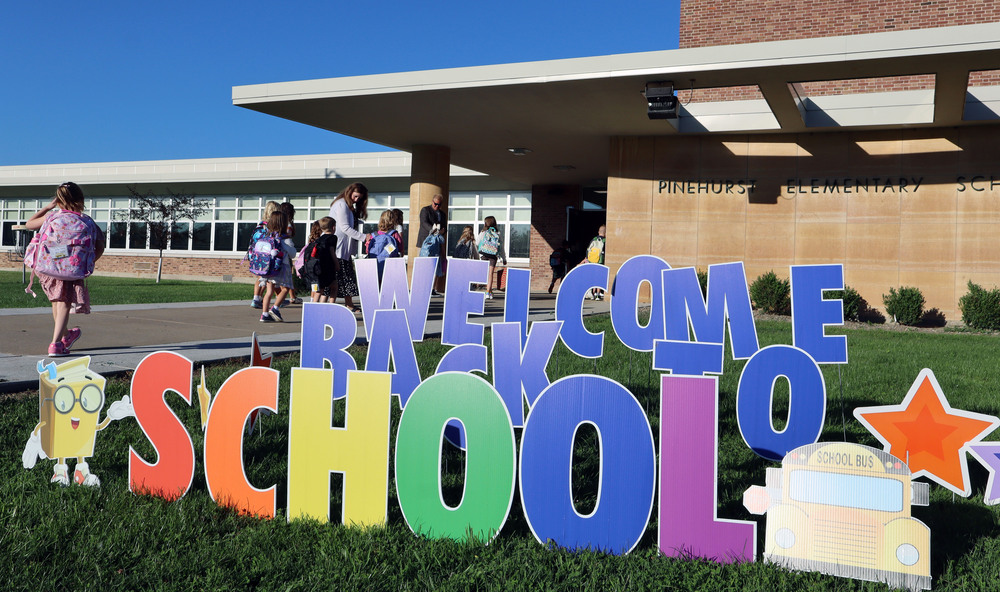 A Welcome Back to School sign greets returning students at Pinehurst Elementary