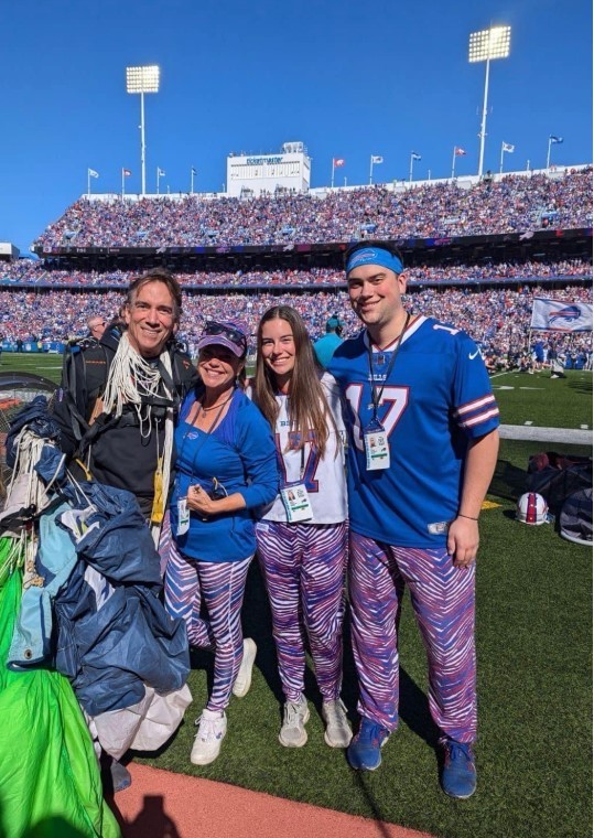 Skydiver posing with his family