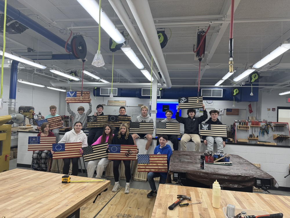 Students with wooden flags