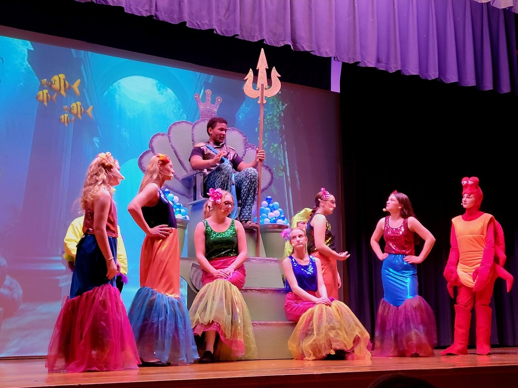 King Triton and his daughters