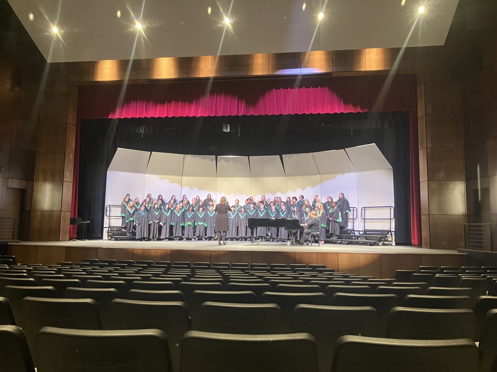 Listening to the Pipestone choir perform.