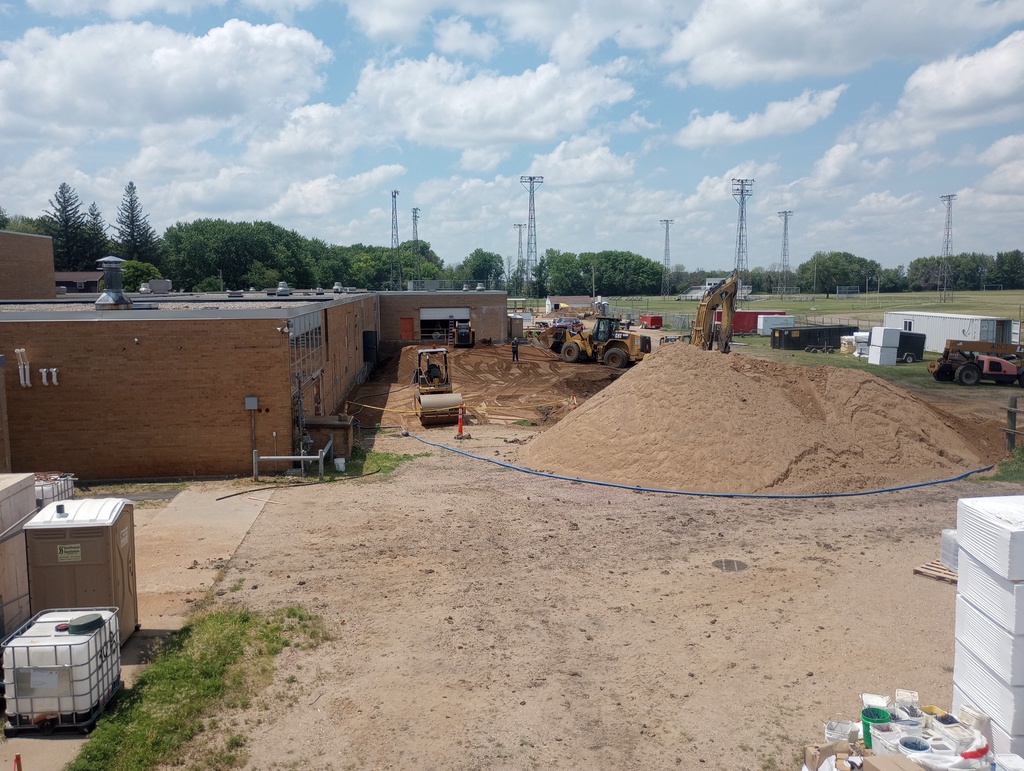 Excavation and soil correction on building North side.