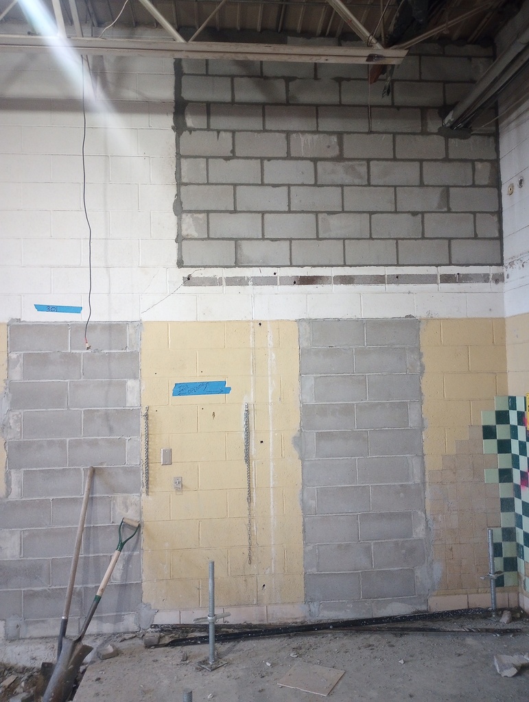 Concrete block filling of openings.