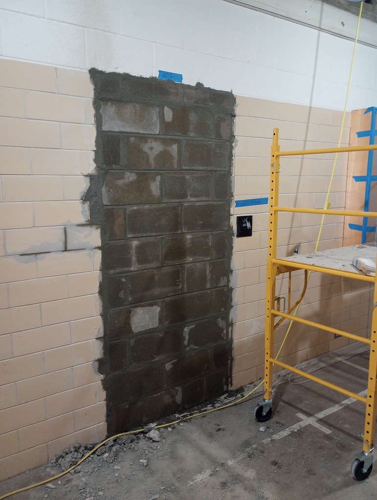 Wall opening infilling.