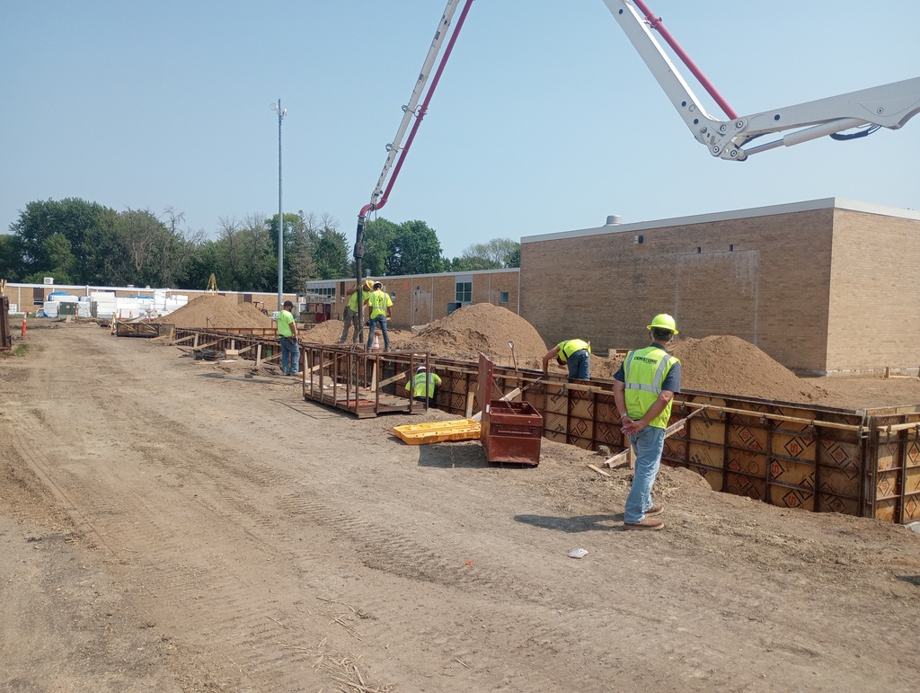 Pouring concrete foundation.