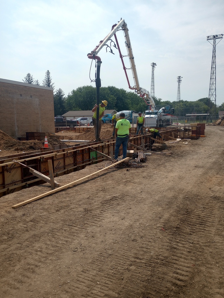 Pouring concrete foundation.