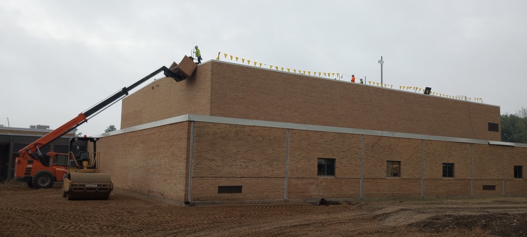 Removal of the rock and roofing the HS Gym.