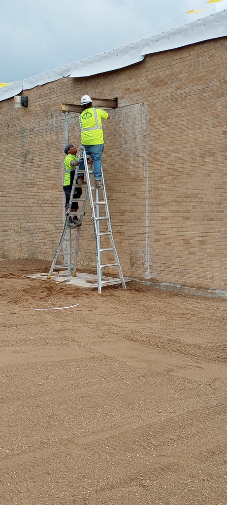 Wall removal to make way for access into the new wood shop area.