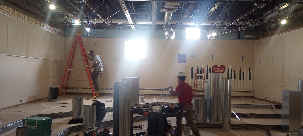 HVAC unit and duct installation in the Band Room.