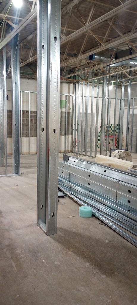 Framing of the walls for the new PreK-12 Library began.  The Library will be in the former Wood Shop.
