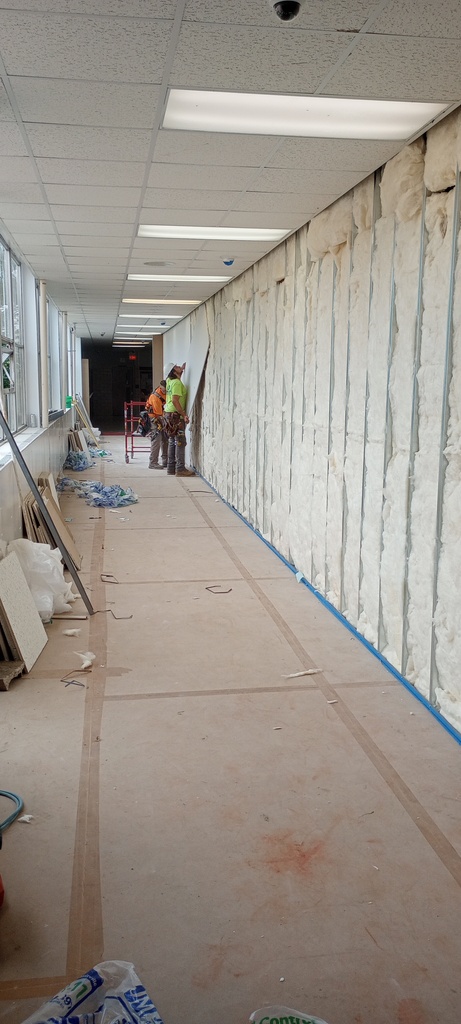 In preparation for the start of school, a temporary wall has been installed in the south hallway of the building to allow for safe hall passage.
