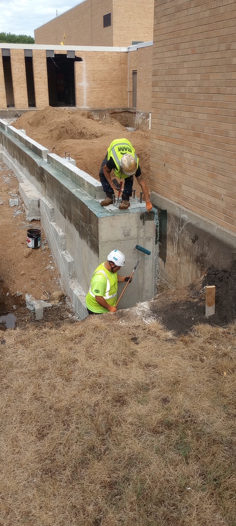 Waterproofing south foundation wall.
