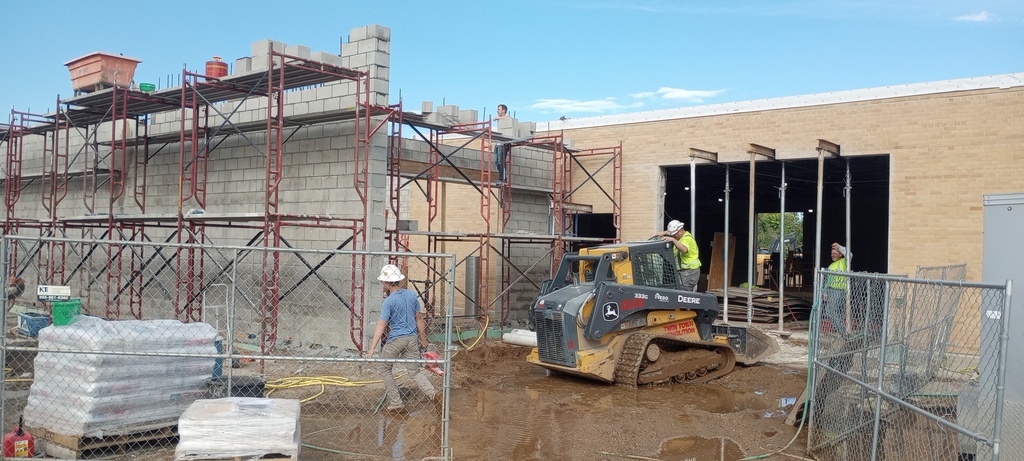 Wood Shop wall construction nearing completion.  The west wall of the Ag Shop was opened up to make way for a new overhead and passage door.