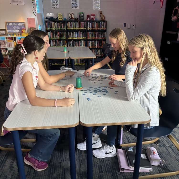 Mrs. Hubbell’s class practiced putting together a puzzle with seeing the picture today. How will this help them write their social contract this week?