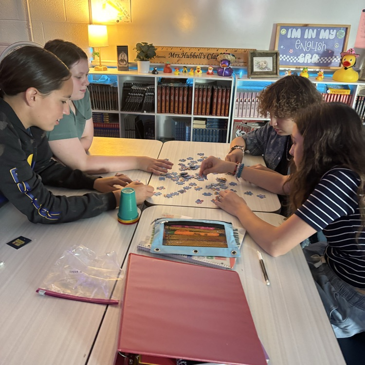 Mrs. Hubbell’s class practiced putting together a puzzle with seeing the picture today. How will this help them write their social contract this week?
