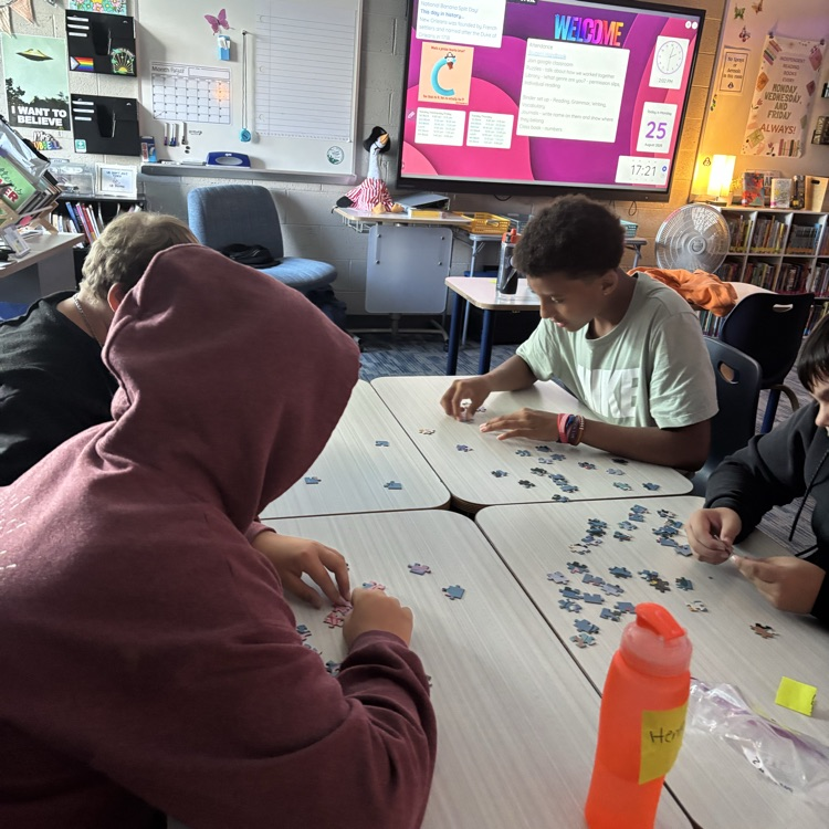 Mrs. Hubbell’s class practiced putting together a puzzle with seeing the picture today. How will this help them write their social contract this week?