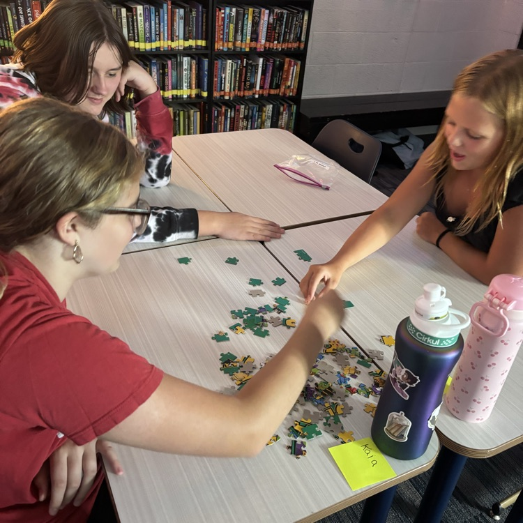 Mrs. Hubbell’s class practiced putting together a puzzle with seeing the picture today. How will this help them write their social contract this week?
