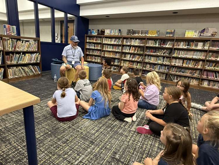 First graders meet the mailman!