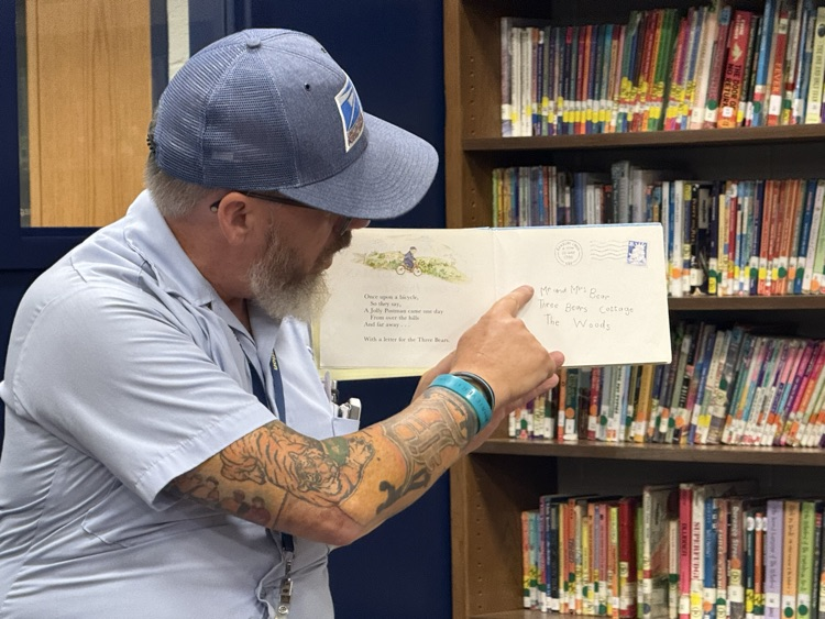 First graders meet the mailman!