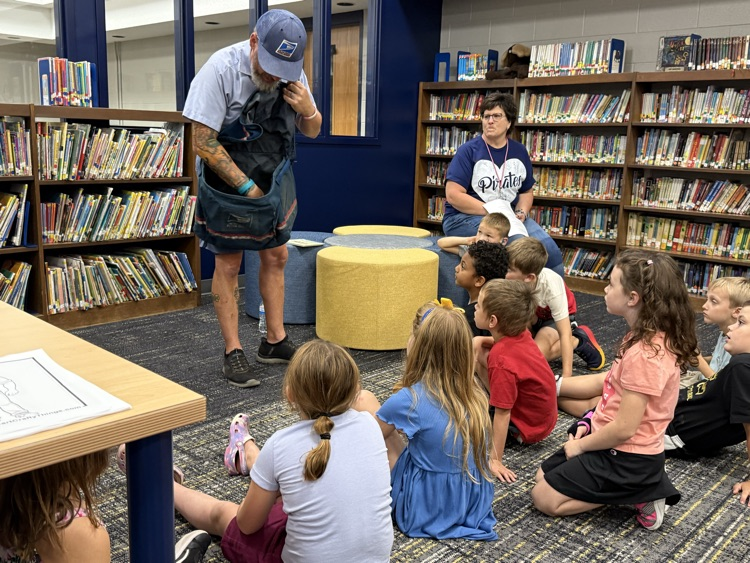 First graders meet the mailman!