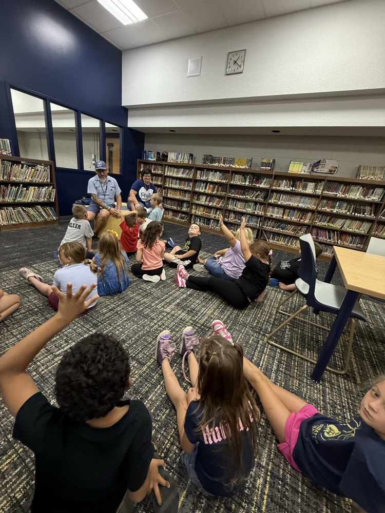 First graders meet the mailman!