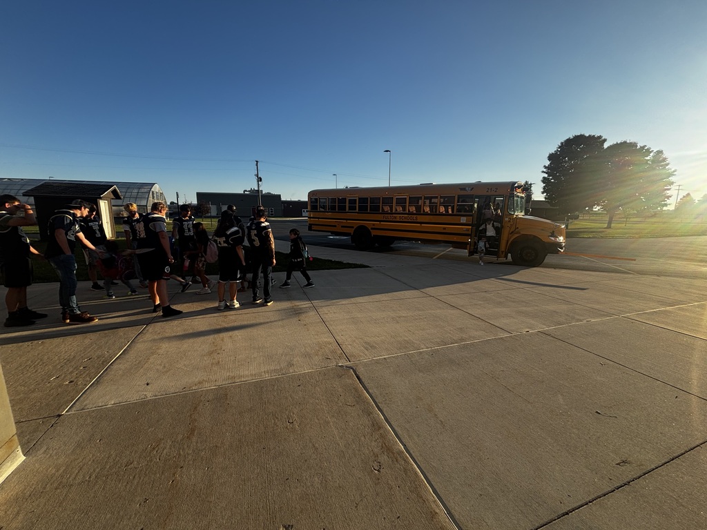 Varsity Football Welcomes Elementary Students