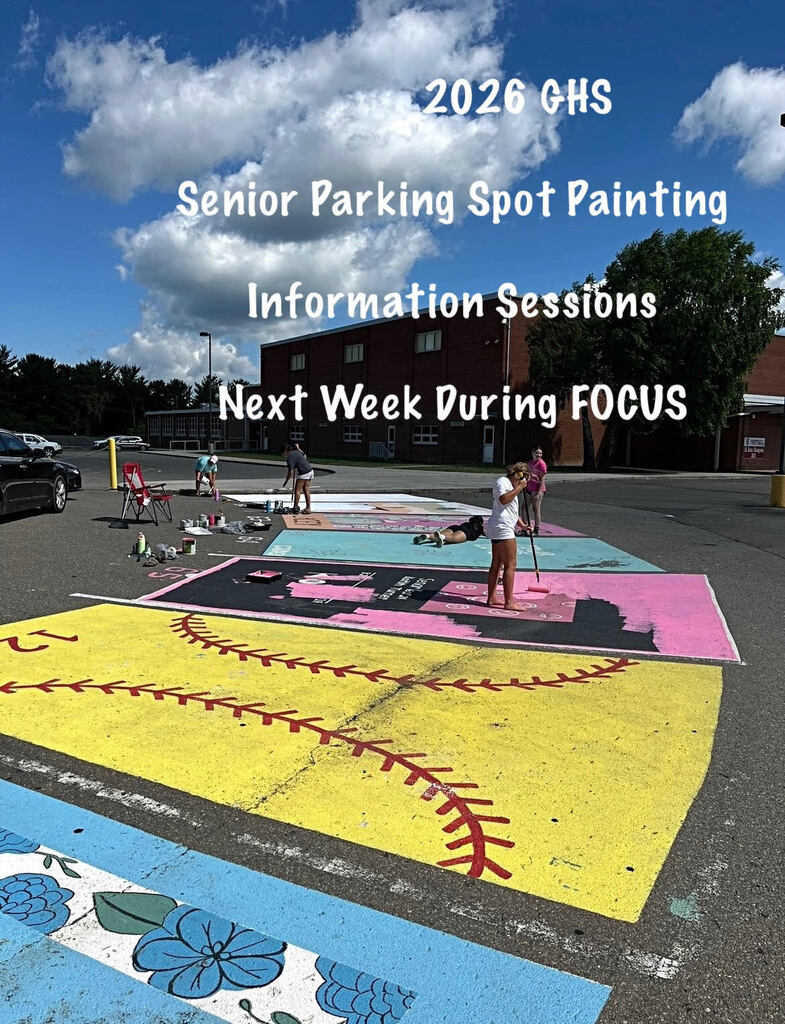 Bright sky with clouds. A school parking lot with large painted parking spots. A woman stands in the center, surrounded by others painting.