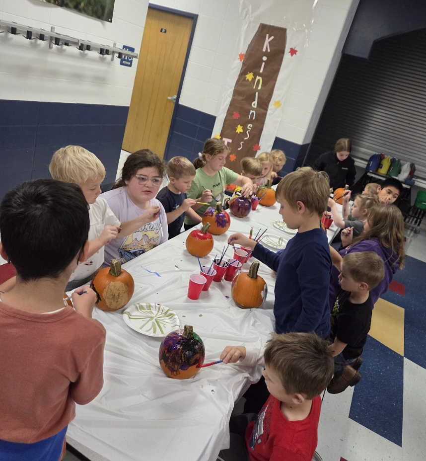 4K & 4th Graders Painting Pumpkins