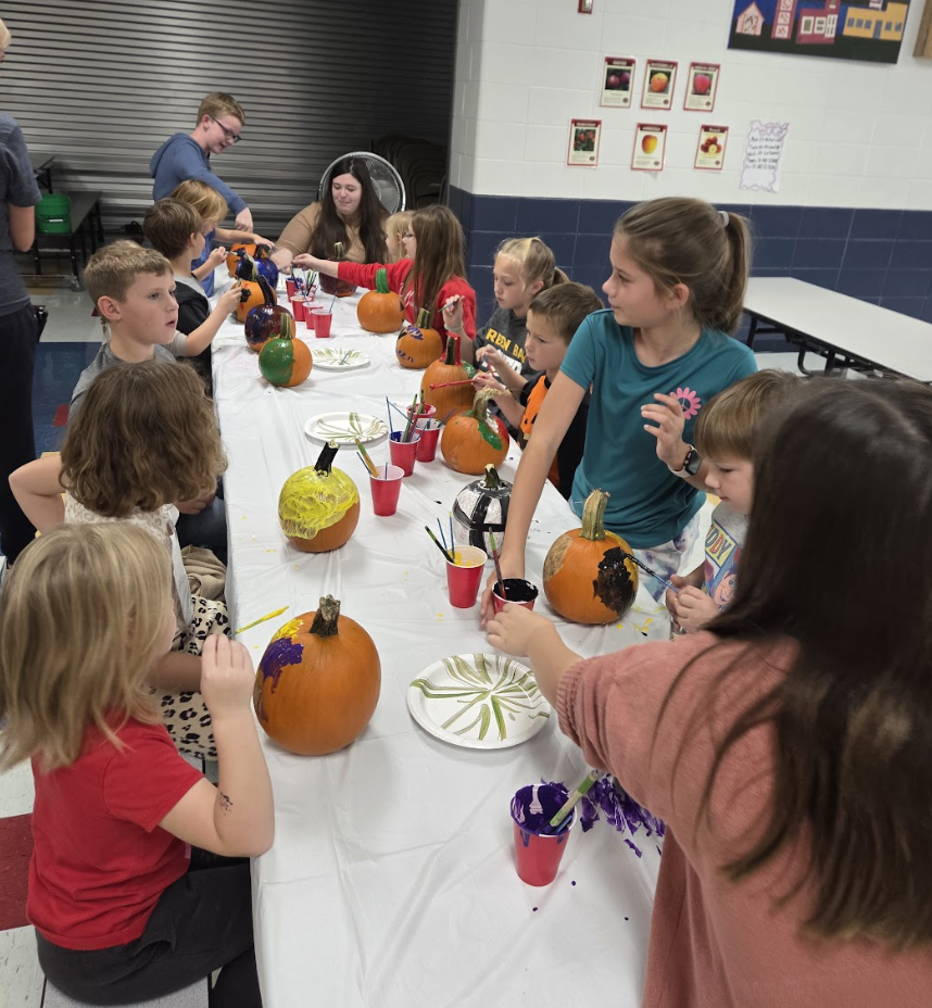 4K & 4th Graders Painting Pumpkins