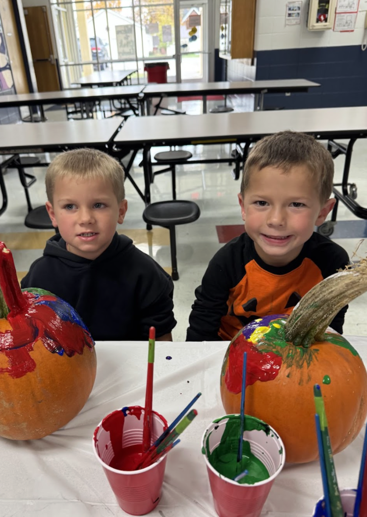 4K & 4th Graders Painting Pumpkins