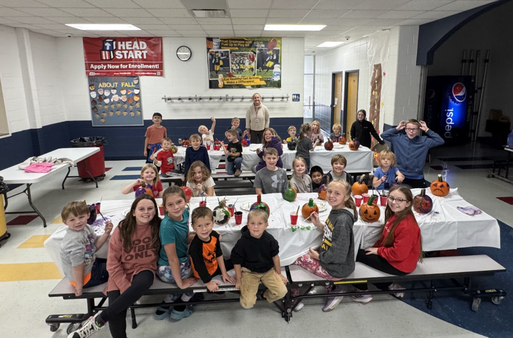 4K & 4th Graders Painting Pumpkins