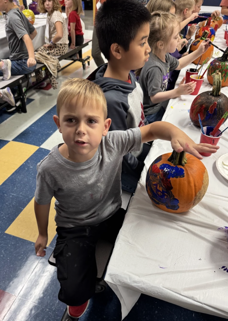4K & 4th Graders Painting Pumpkins
