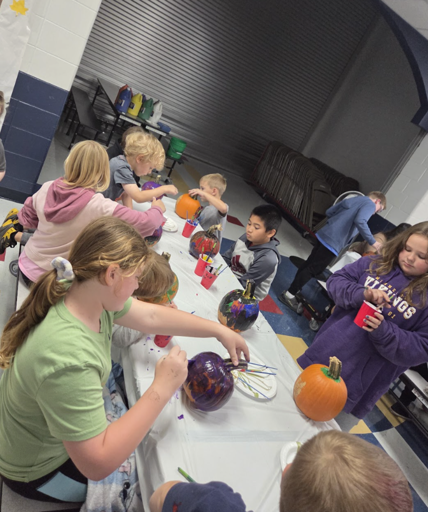 4K & 4th Graders Painting Pumpkins