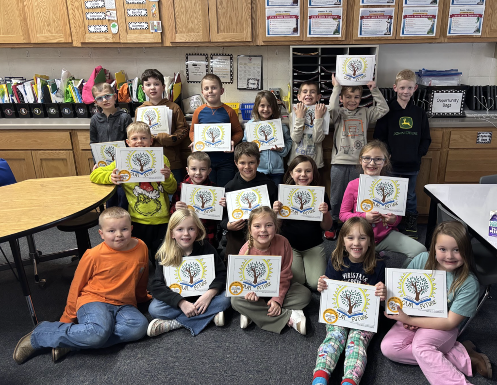 Students with their published book