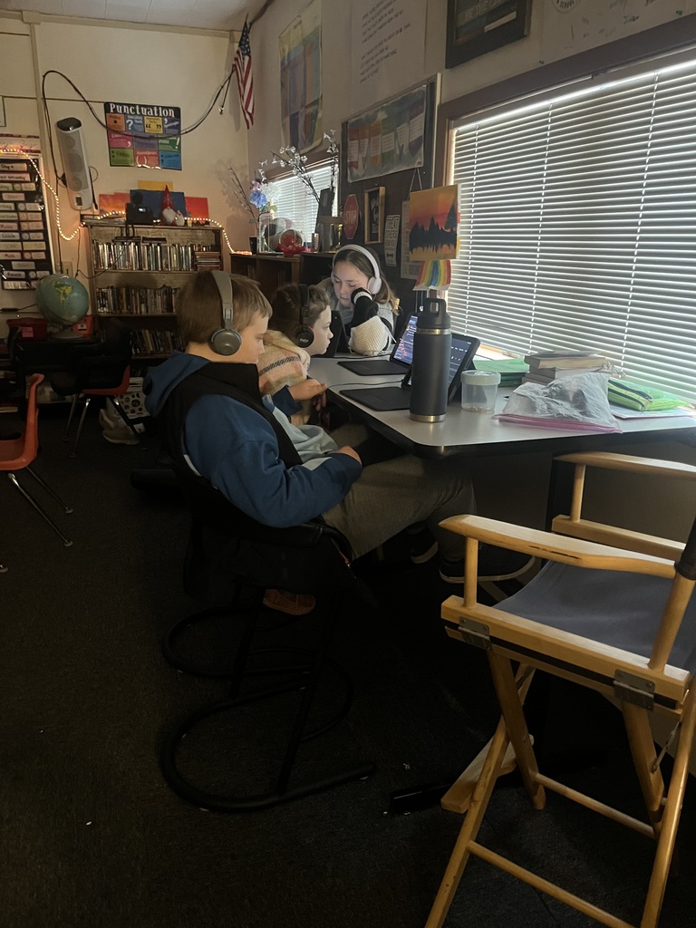 Students listening to podcasts with snacks, drinks, and blankets