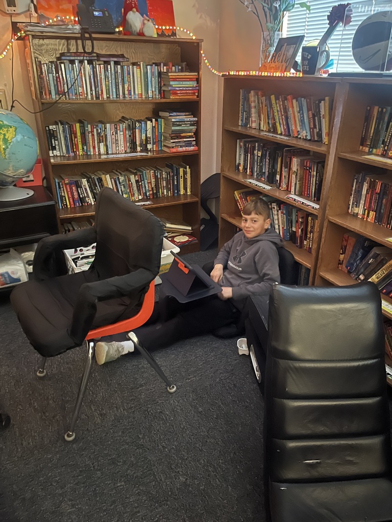Students listening to podcasts with snacks, drinks, and blankets
