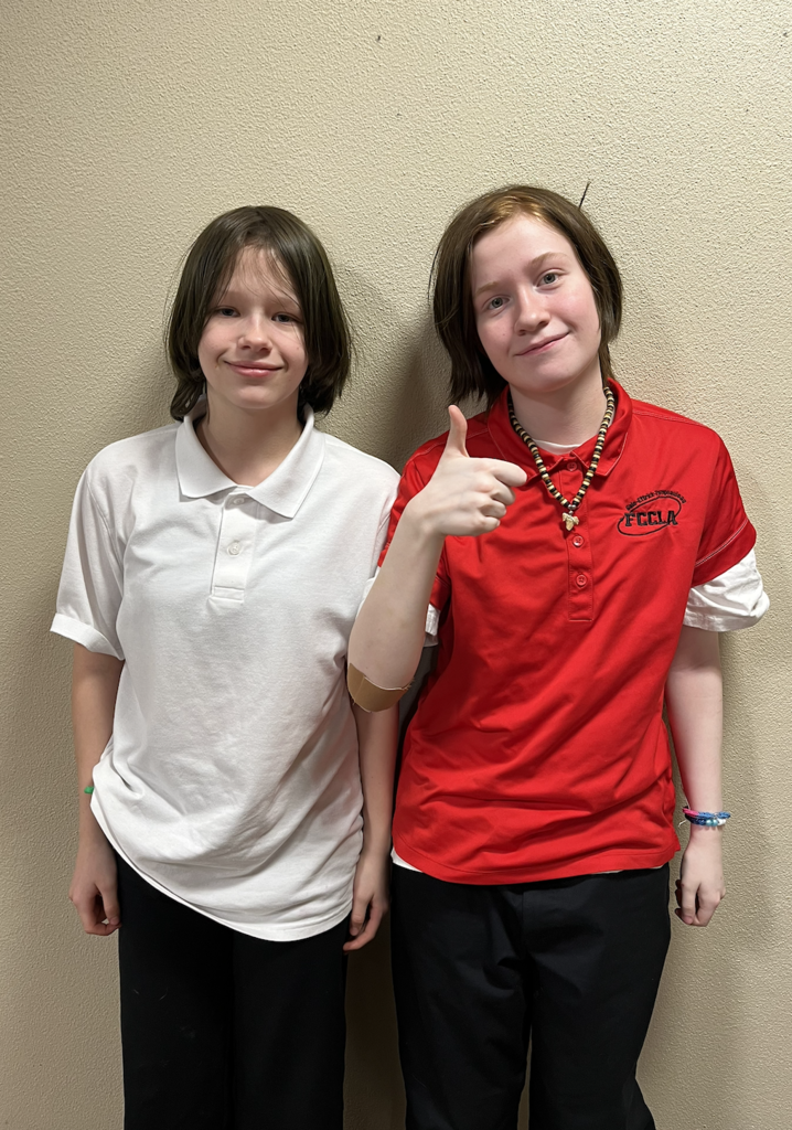 Two students after competing in Public Policy Advocate. 