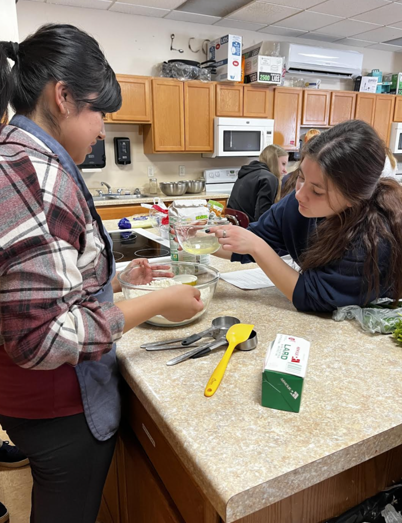 Students preparing the masa for our tamales