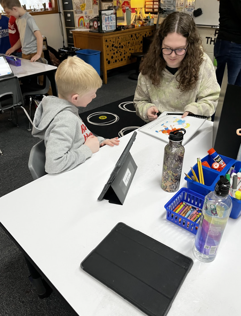 Students read Bob the Builder Makes a Friend!
