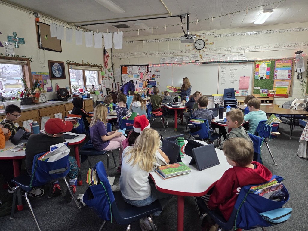Raylin reading to students