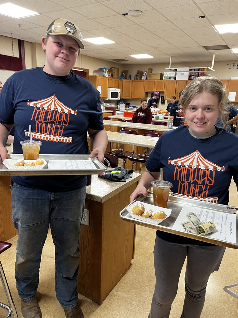 Two students ready to deliver their orders!